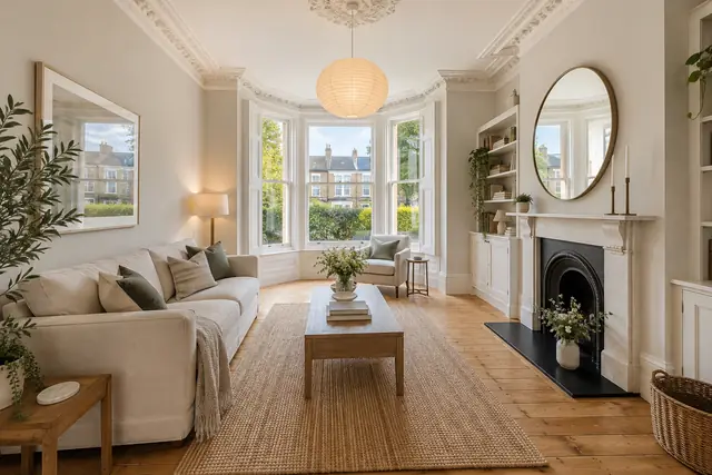 Period bay-window living room, original still photo