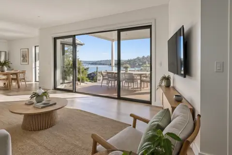 Coastal living area onto a deck, video frame at 5s